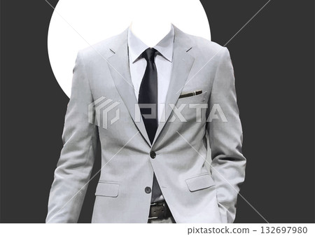 Businessman wearing a gray suit with a black tie is standing with his hand in his pocket 132697980