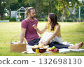 Happy family picnic in the park public on summer holiday.  Family relax and enjoying outdoor.  132698130
