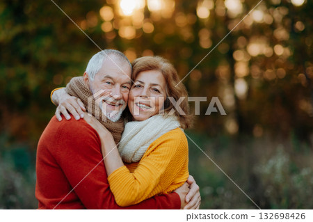 Portrait of senior couple in autumn nature. Portrait of senior couple in autumn nature. 132698426