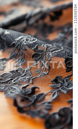 Black lace fabric with floral pattern texture used for fashion and design Black lace fabric with floral pattern texture used for fashion and design 132698594