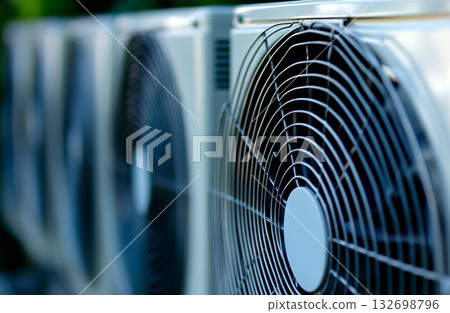 detail of an air conditioner or conditioning unit grille. HVAC cooling fan detail background. air conditioning unit grille close up cool air detail of an air conditioner or conditioning unit grille. HVAC cooling fan detail background. air conditioning unit grille close up cool air 132698796