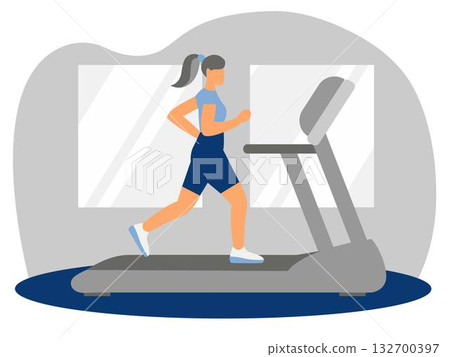 Woman running on a treadmill indoors. 132700397