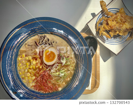 Japanese ramen noodles, with half egg, corn, vegetable and fried crab from top view 132700543