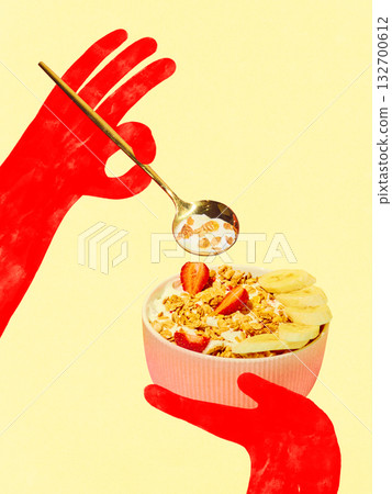 Trendy composition. Red hands holding yogurt bowl with granola banana and strawberries 132700612