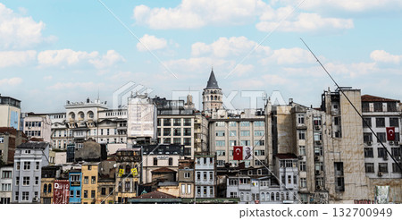 ISTANBUL, TURKEY - NOVEMBER 01, 2025: Galata Tower and Ataturk poster view ISTANBUL, TURKEY - NOVEMBER 01, 2025: Galata Tower and Ataturk poster view 132700949