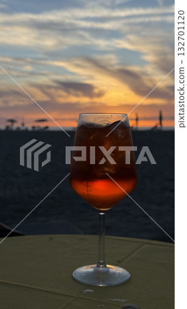 Aperitif at Sunset on the Beach with Scenic View 132701120