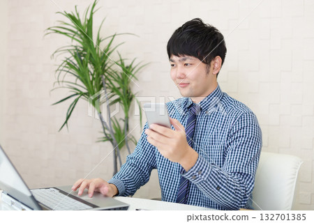 Businessmen with smartphones Businessmen with smartphones 132701385