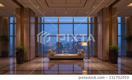 A luxurious lounge or lobby with panoramic windows overlooking the city's night skyline. 132702059