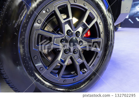 A detailed close-up shot of a modern car wheel A detailed close-up shot of a modern car wheel 132702295