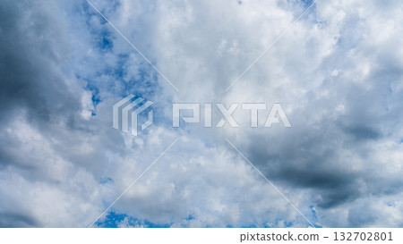 Many white clouds flowing in the summer blue sky Many white clouds flowing in the summer blue sky 132702801