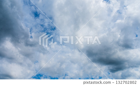 Many white clouds flowing in the summer blue sky Many white clouds flowing in the summer blue sky 132702802