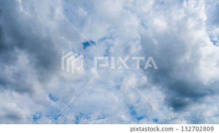 Many white clouds flowing in the summer blue sky 132702809