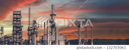 Banner Oil refinery gas petrol plant industry with crude tank, gasoline supply chemical factory. Petroleum barrel fuel heavy industry oil refinery manufacturing factory plant on twilight night time 132703061