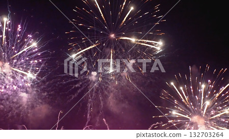 Purple Firework celebrate anniversary happy new year 2024, 4th of july holiday festival. Purple firework in night time celebrate national holiday. Violet firework Countdown to new year 2024 festival 132703264