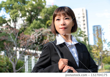 Female employees making rounds Female employees making rounds 132704175
