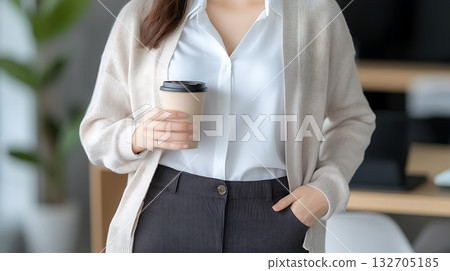 Confident Young Man Smiling in Modern Cafe with Stylish Interior and Friendly Atmosphere Confident Young Man Smiling in Modern Cafe with Stylish Interior and Friendly Atmosphere 132705185