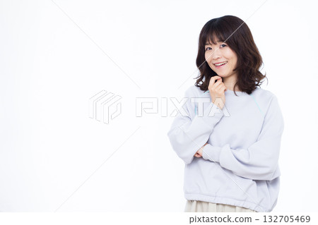 Woman thinking with a smile 132705469