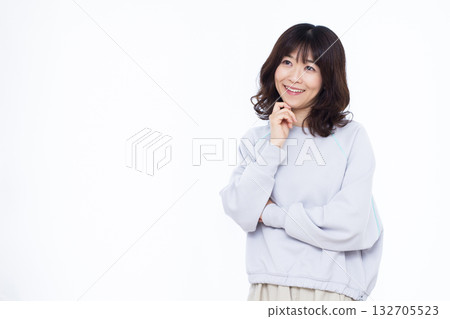 Woman thinking with a smile 132705523