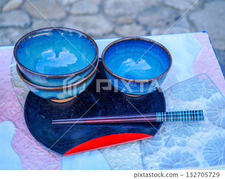 A landscape with colorful teacups A landscape with colorful teacups 132705729