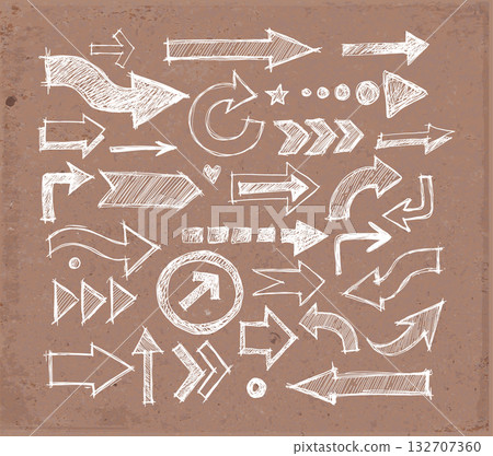 Collcetion of hand-drawn doodle sketch arrows in various styles and directions, sketched with a rough, artistic feel on brown parcel paper background 132707360