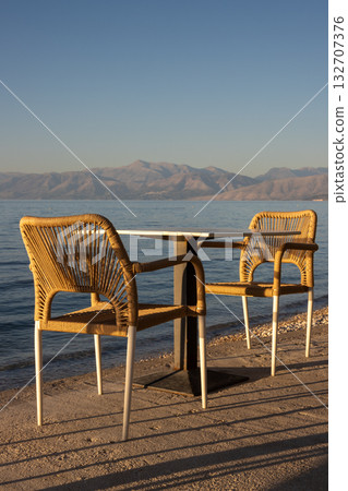 Empty restaurant terrace with seaview, Greece Empty restaurant terrace with seaview, Greece 132707376