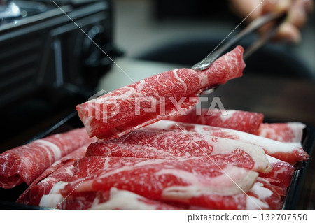 Thinly Sliced Raw Beef for Hot Pot or Shabu-Shabu 132707550
