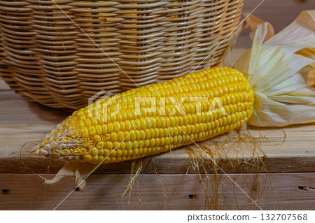 Freshly Boiled Sweet Corn in a Rustic Woven Basket Freshly Boiled Sweet Corn in a Rustic Woven Basket 132707568