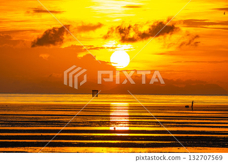 Golden sunrise above the ocean at Sapanhin viewpoint Phuket 132707569