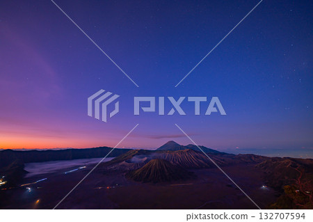 Aerial view the first light shine on Bromo volcano group twilight. 132707594