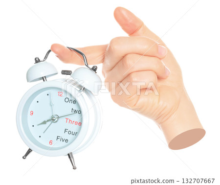 Woman hand holds alarm clock, isolated on transparent background, office and household items concept. Contemporary art 132707667
