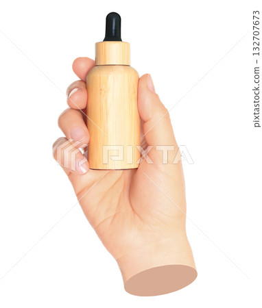 Woman hand holds bamboo cosmetics bottle, isolated on transparent background, natural and eco cosmetics concept. Contemporary art Woman hand holds bamboo cosmetics bottle, isolated on transparent background, natural and eco cosmetics concept. Contemporary art 132707673