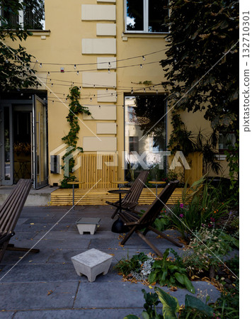 Empty tables and chairs outside Empty tables and chairs outside 132710301