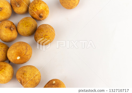 Longan Fruits Scattered and Piled on White Background 132710717
