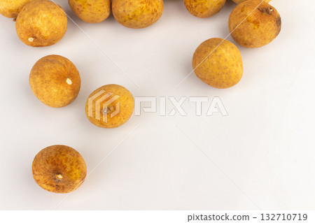 Longan Fruits Scattered and Piled on White Background Longan Fruits Scattered and Piled on White Background 132710719