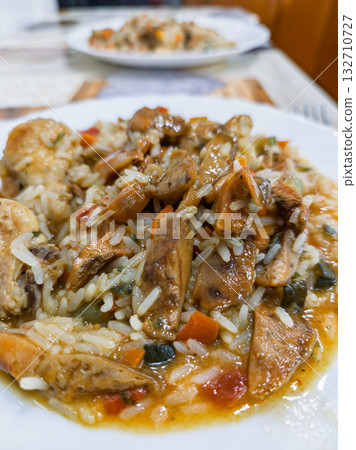 Wild mushrooms sauteed with garlic and parsley in olive oil. Mediterranean cuisine Wild mushrooms sauteed with garlic and parsley in olive oil. Mediterranean cuisine 132710727