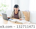 Young woman studying at home 132711471