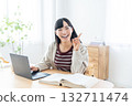 Young woman studying at home 132711474