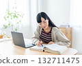 Young woman studying at home 132711475