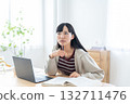 Young woman studying at home 132711476