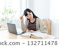 Young woman studying at home 132711478