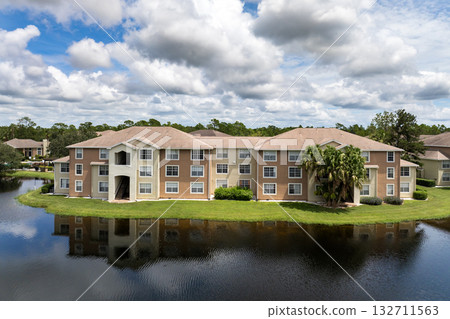 Apartment residential condos in Florida suburban area. American condominiums as example of real estate development in USA suburbs 132711563