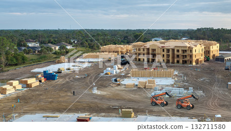 Apartment condos under construction. Development of residential housing in North Port, Florida. Real estate market in the USA Apartment condos under construction. Development of residential housing in North Port, Florida. Real estate market in the USA 132711580