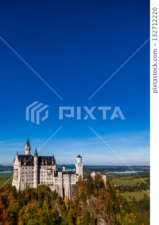 The magnificent view of Neuschwanstein Castle in the autumn morning light 132712220
