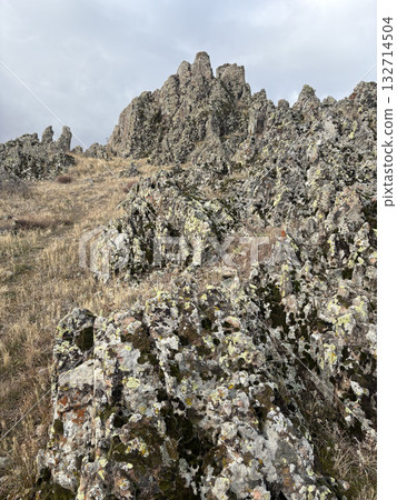 bare rocks cliffs relief cloudy bare rocks cliffs relief cloudy. High quality photo bare rocks cliffs relief cloudy bare rocks cliffs relief cloudy. High quality photo 132714504