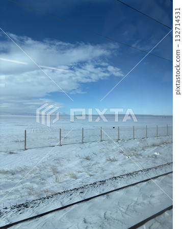 view from the train on a snowy road. High quality photo view from the train on a snowy road. High quality photo 132714531