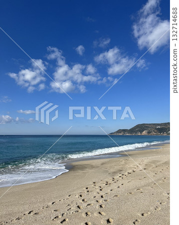 Beach waves footprints. High quality photo 132714688