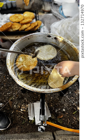 Hand frying pastries. High quality photo 132714970