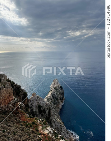 stone wall ruins mountain sea horizon cloudy. High quality photo stone wall ruins mountain sea horizon cloudy. High quality photo 132714996