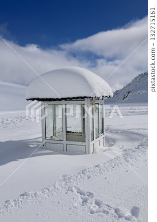 A building with snow on the ground. High quality photo A building with snow on the ground. High quality photo 132715161