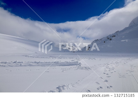 Snowy mountain ski-lift no people, blue sky, azure, air, freshness, ecology. High quality photo Snowy mountain ski-lift no people, blue sky, azure, air, freshness, ecology. High quality photo 132715185